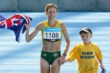 'Pride of Illawarra'...Kerryn McCann celebrates Commonwealth gold with her then eight-year-old son Benton.