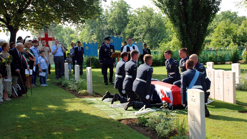 The remains of the crew of Boston BZ590 are laid to rest with military honours.