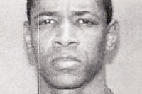 A close up, black and white photo of John Allen Muhammad.