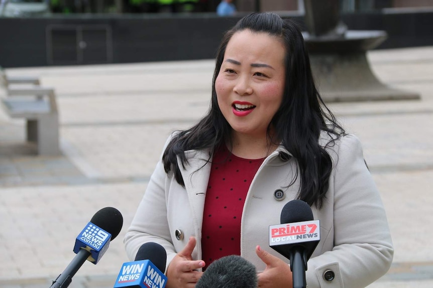 Elizabeth Lee speaks to the media.