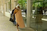 Time for settlement...Allan Campbell  walks into the Reserve Bank in Sydney.