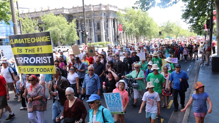 Protestors march at a climate change rally in Adelaide.
