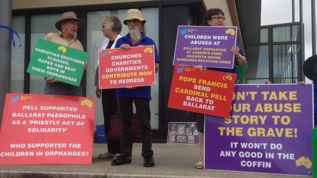 Protesters outside the child abuse royal commission