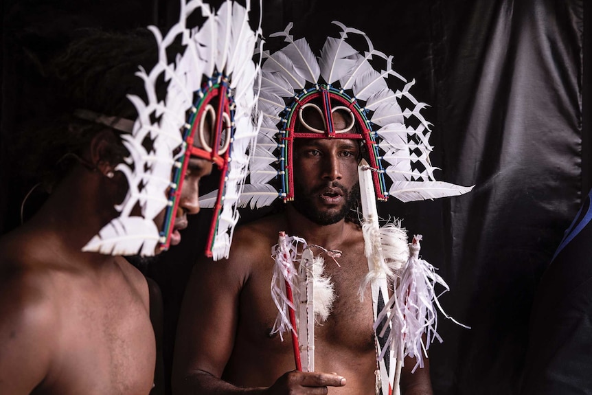 Colour photo of Daniel David and Naseti Hankin of URAB Dancers side of stage at Dance Rites 2018.