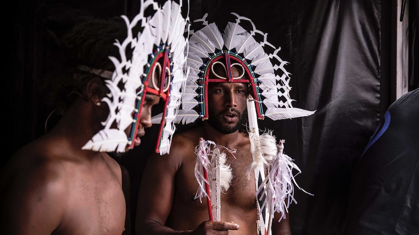 Colour photo of Daniel David and Naseti Hankin of URAB Dancers side of stage at Dance Rites 2018.