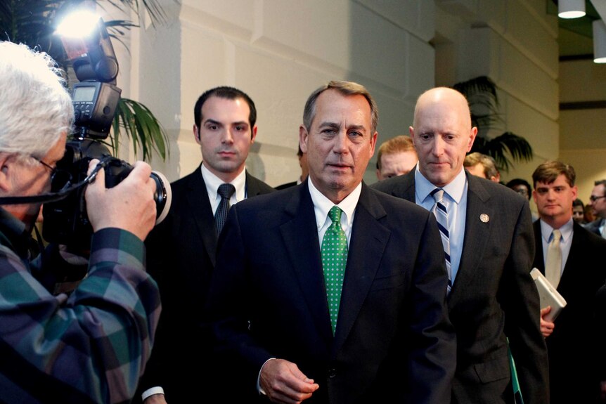 John Boehner walks out with House Republicans.