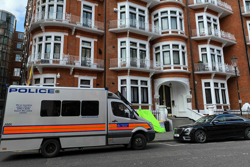 A police van parked outside the Ecuadorian Embassy in London.