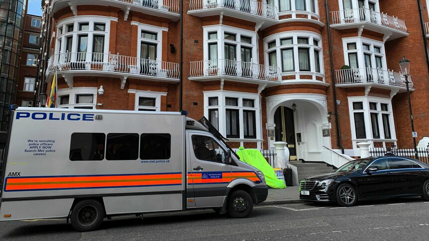 A police van parked outside the Ecuadorian Embassy in London.