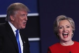 Republican presidential nominee Donald Trump and Democratic presidential nominee Hillary Clinton shake hands.