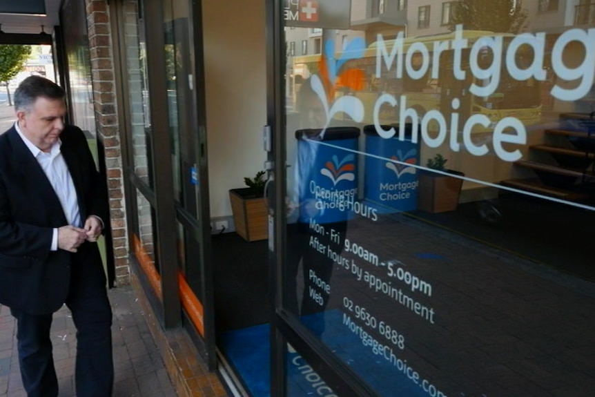 Aurelio Tenaglia walks into his Mortgage Choice shop