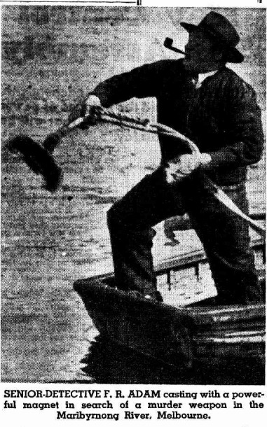 A black and white photo of a man throwing a heavy magnet.