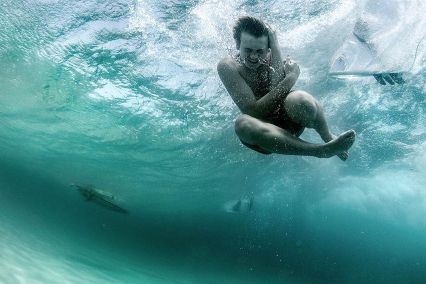 A surfer underwater