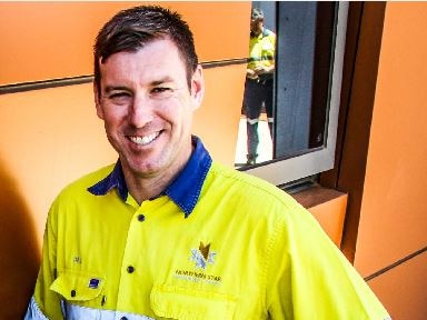 Mining boss wearing high-vis workwear