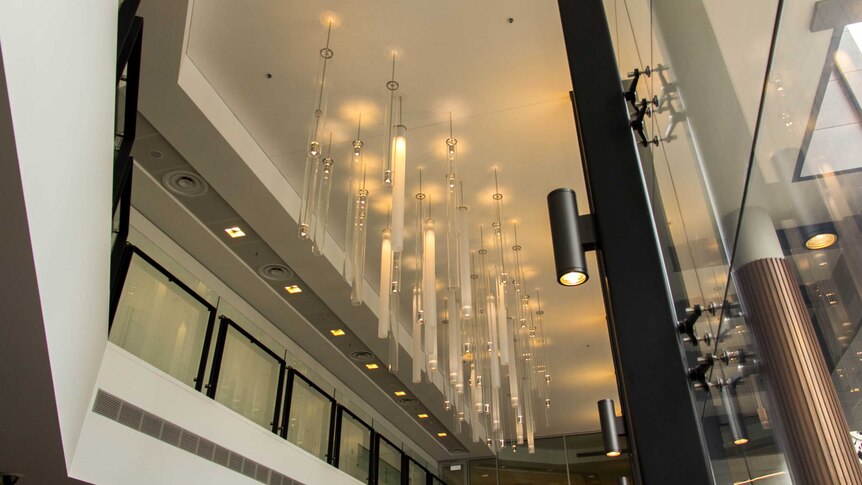 Lighting hangs from Newcastle Court foyer.