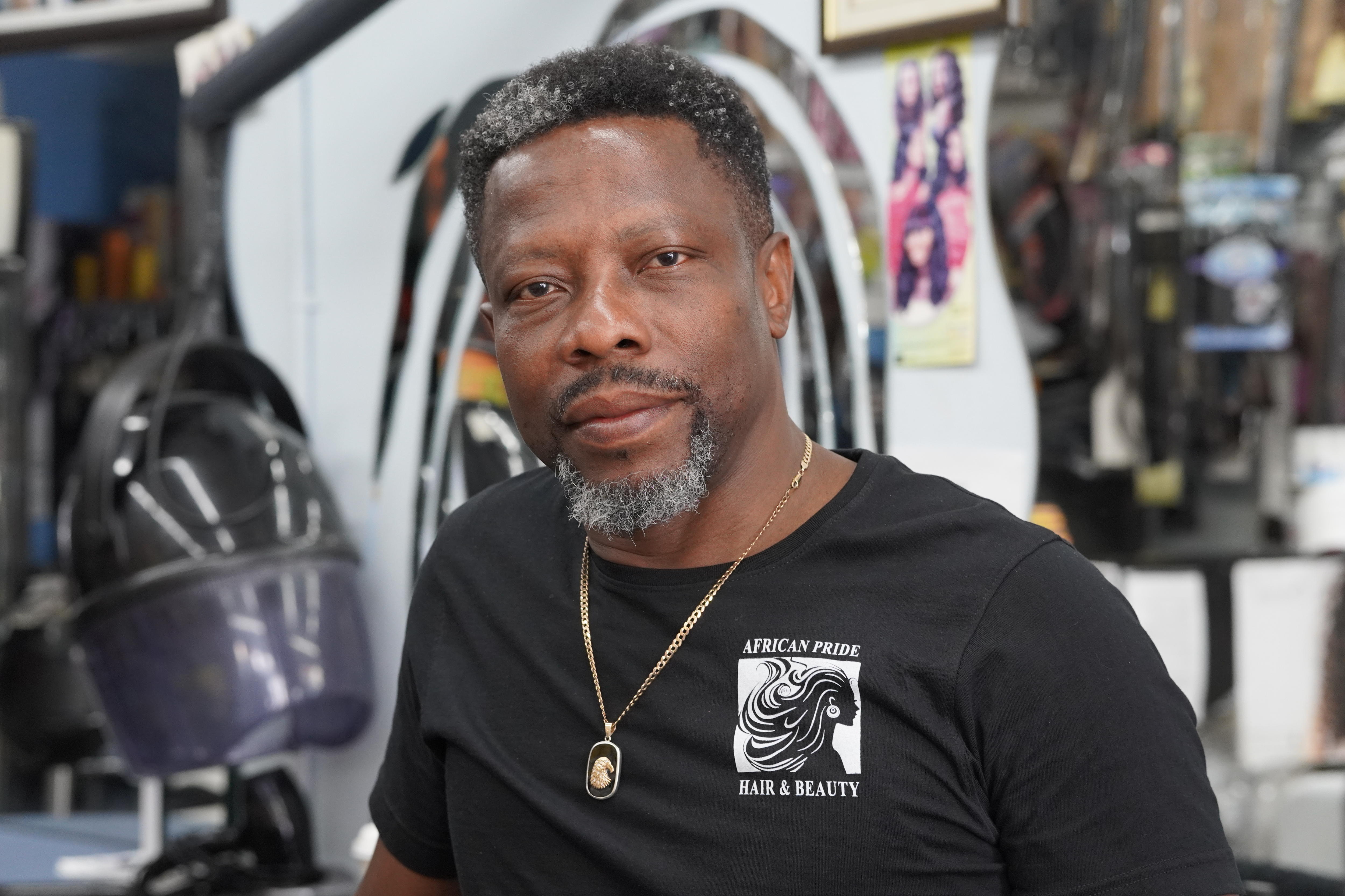 Chika Isaac in his shop.