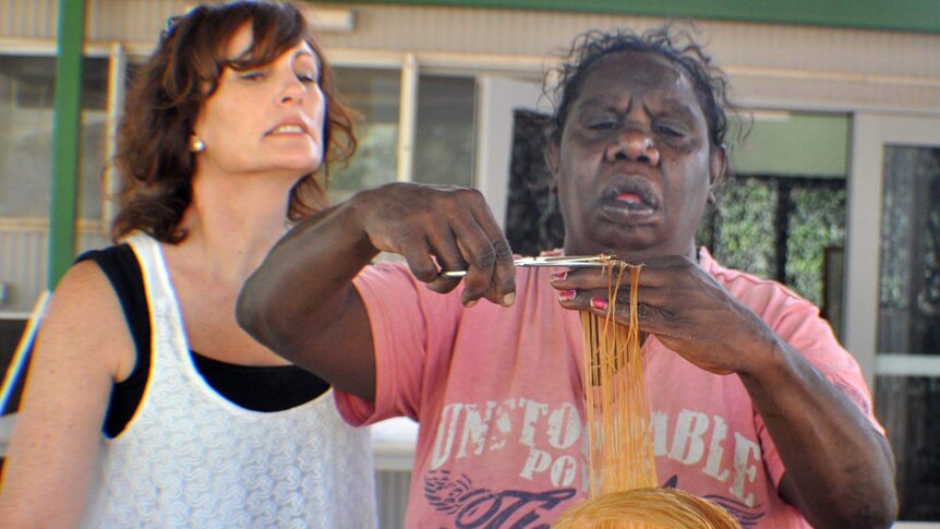 Aboriginal women in Halls Creek are training to become hairdressers, May 2014.