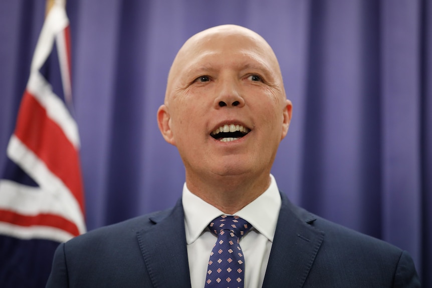 Peter Dutton smiles during first press conference as Opposition Leader.