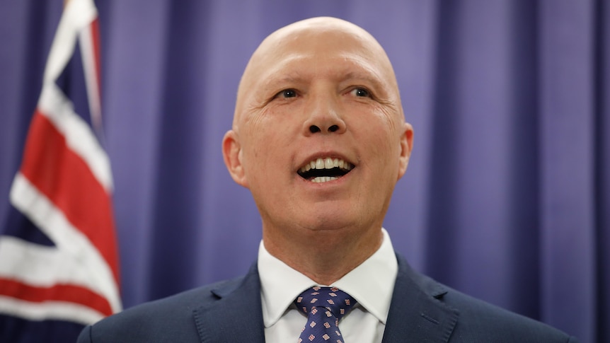 Peter Dutton smiles during first press conference as Opposition Leader.