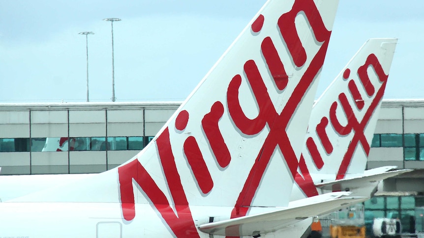Virgin Australia planes parked at Brisbane Airport