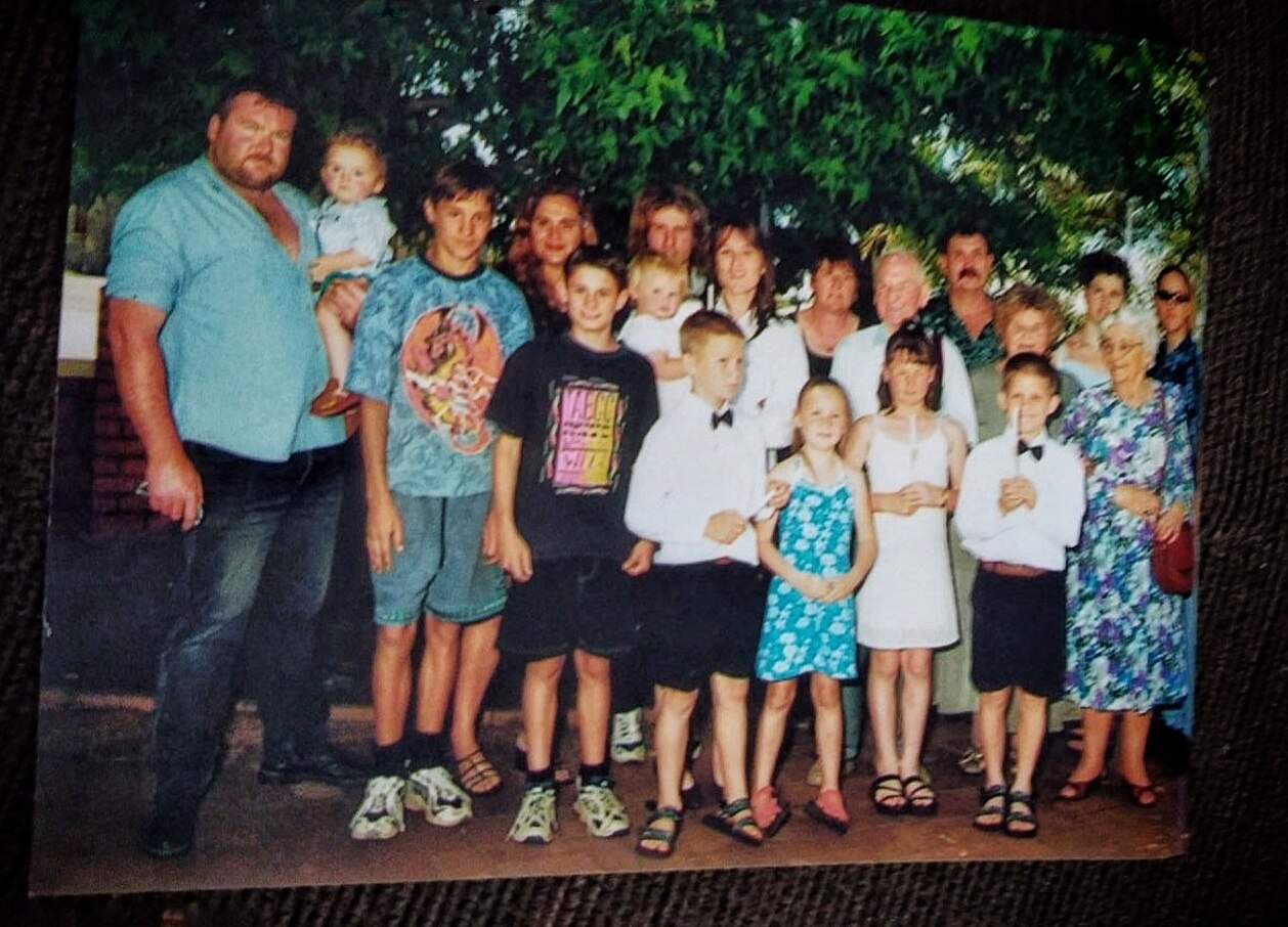 A photo of Stephen and his large family.