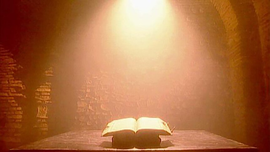 Light falls onto an open book