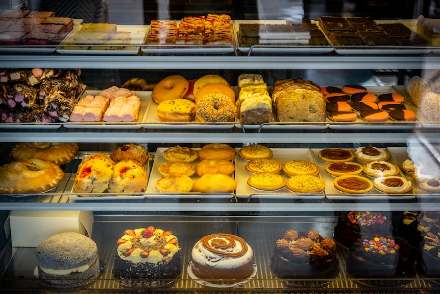 Cakes and treats on shelves at the Hawks Nest bakery.