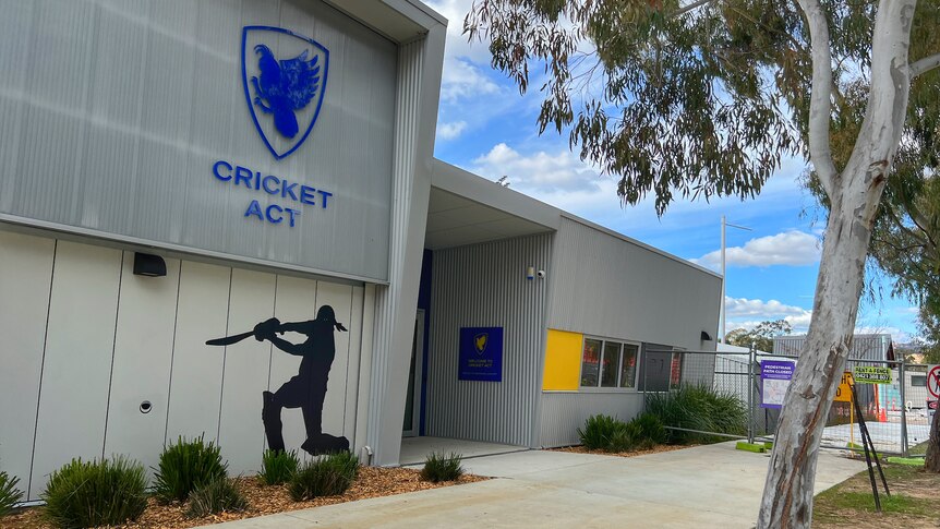 A general view of Cricket ACT headquarters, including a silhouette of a batter hitting a ball.