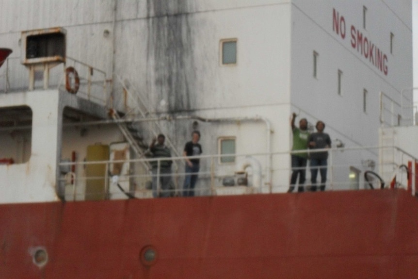 Crew members of MT Marida Marguerite as they finally reach land after more than seven months at sea.