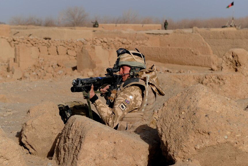 British soldier in Afghanistan in position in patrol in Afghanistan