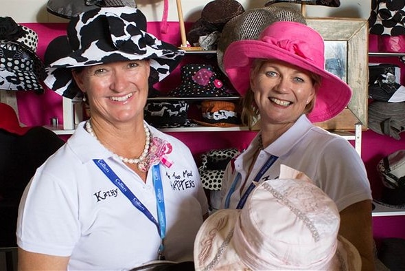 Milliners Kathy Moloney and Robin Strang pose with pink, black and white hats at Beef Australian 2015 event.