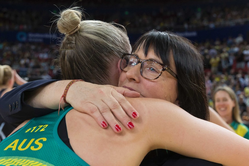 Australian netball coach Lisa Alexander hugs Courtney Bruce