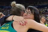 Australian netball coach Lisa Alexander hugs Courtney Bruce