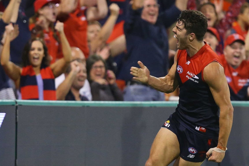 Christian Petracca celebrates his first goal for Melbourne