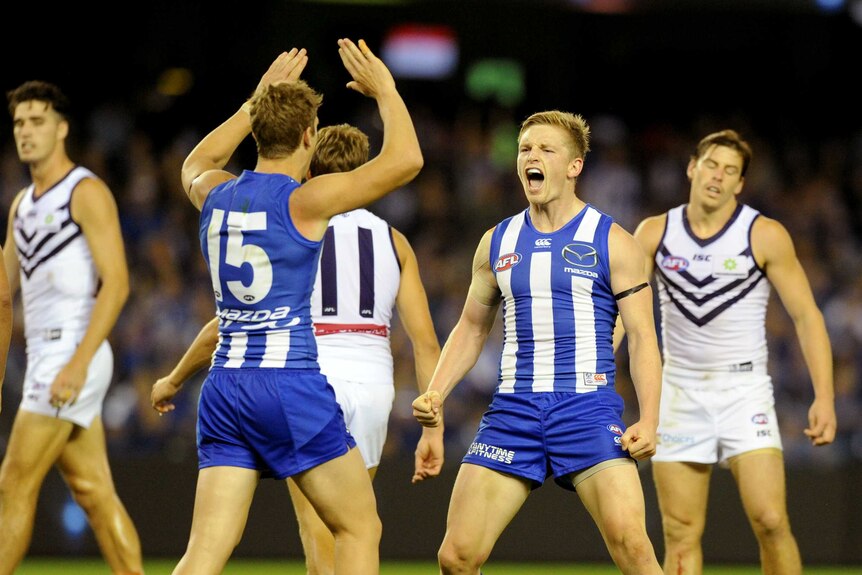 Jack Ziebell celebrates scoring a vital goal for North Melbourne against Fremantle