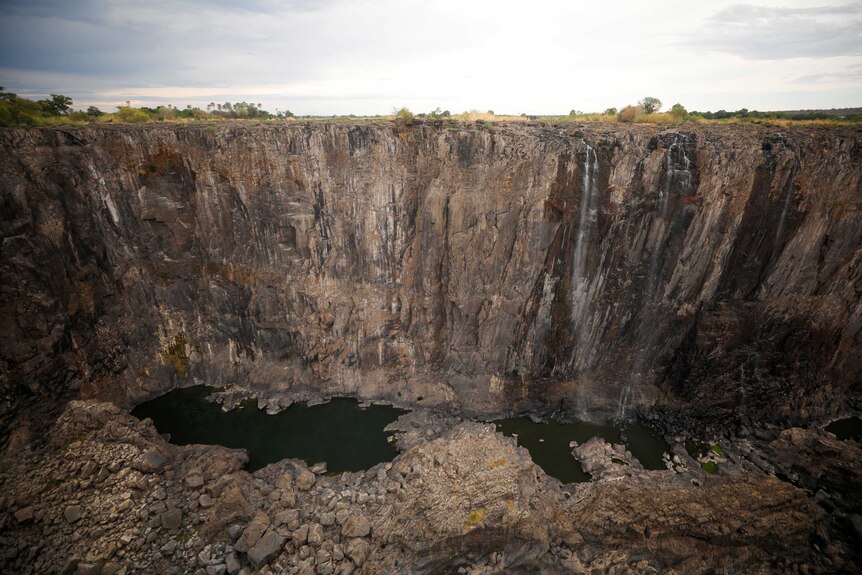 Dry cliffs are seen following a prolonged drought at Victoria Falls, Zimbabwe.