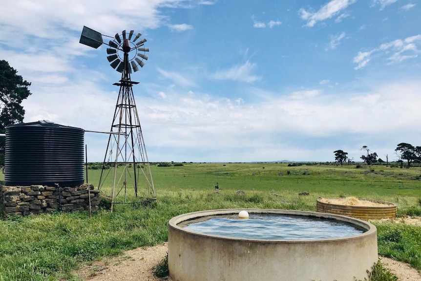 A windmill, tank and large water trough