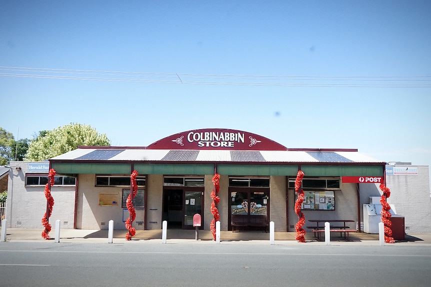The facade of a store carries the words 'Colbinabbin General Store'.