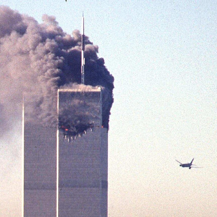 The second plane approaches the World Trade Centre, which is burning, on September 11 2001.