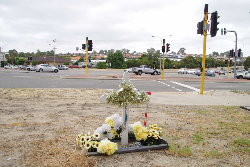 A roadside cross memorial in Wanneroo, Perth, for a crash victim.