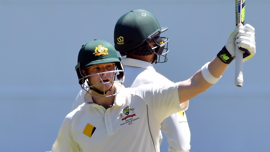 Australia's Steve Smith raises his bat after making 150 at the MCG
