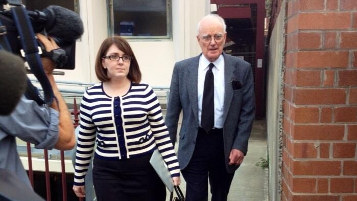 Father William Burston leaving Newcastle court during the Special Commission of Inquiry in 2013.