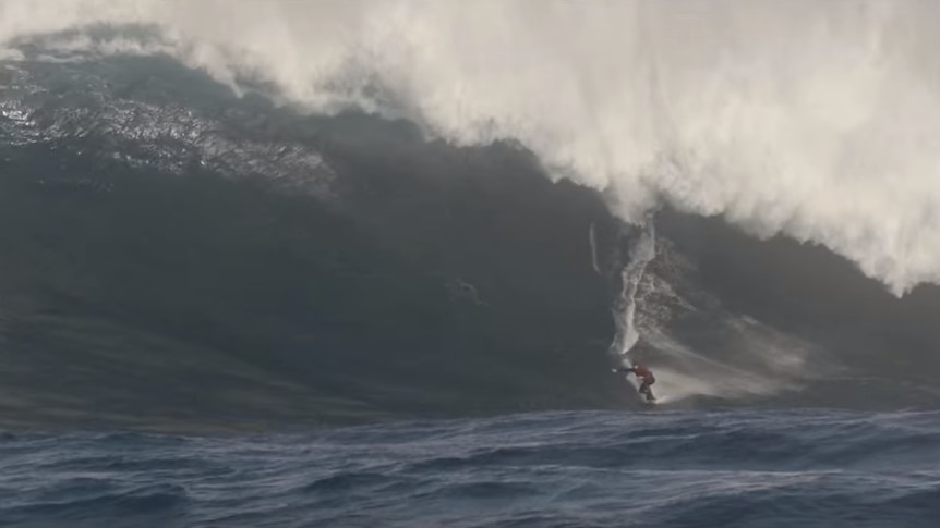 Justin Holland about to get smashed by a wave