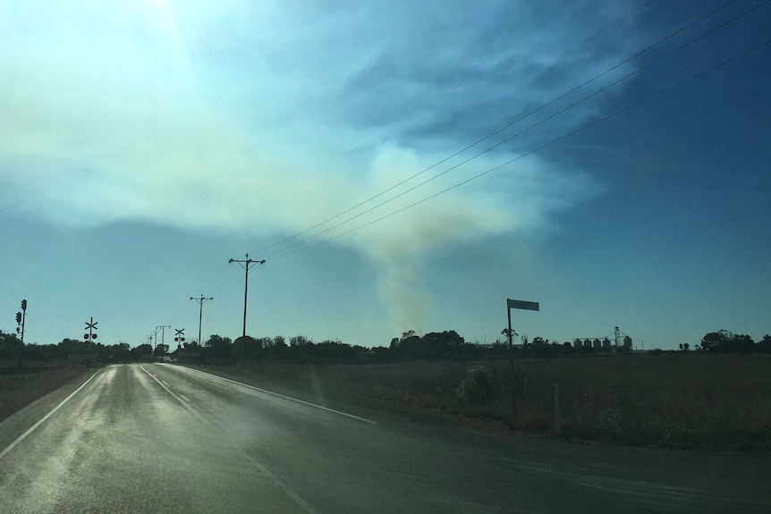 Smoke visible from hay fire