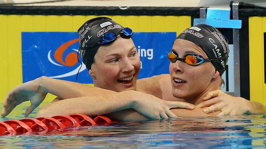 Sister act ... Cate Campbell (L) and Bronte Campbell celebrate finishing first and second