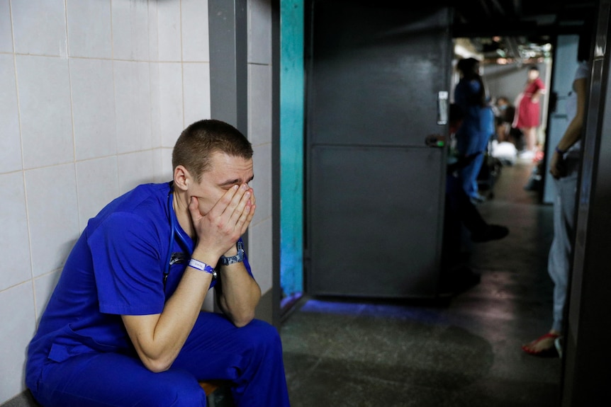A doctor takes shelter in the basement of a perinatal centre in Kyiv
