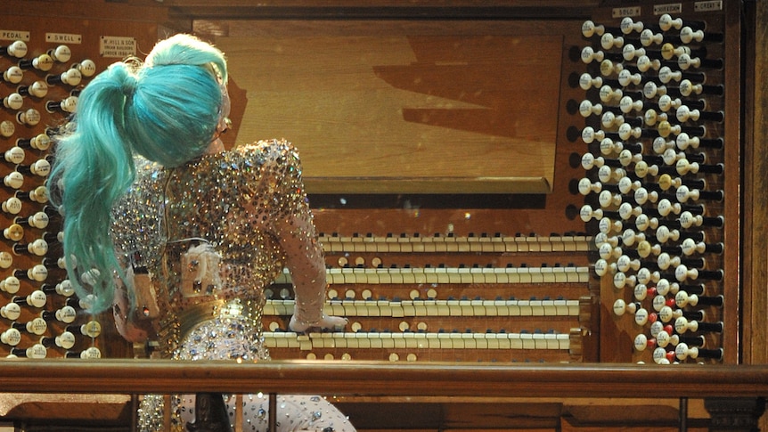 Lady Gaga plays the Sydney Town Hall's pipe organ during her concert.