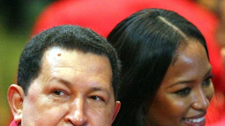 Venezuelan President Hugo Chavez meets with Naomi Campbell.