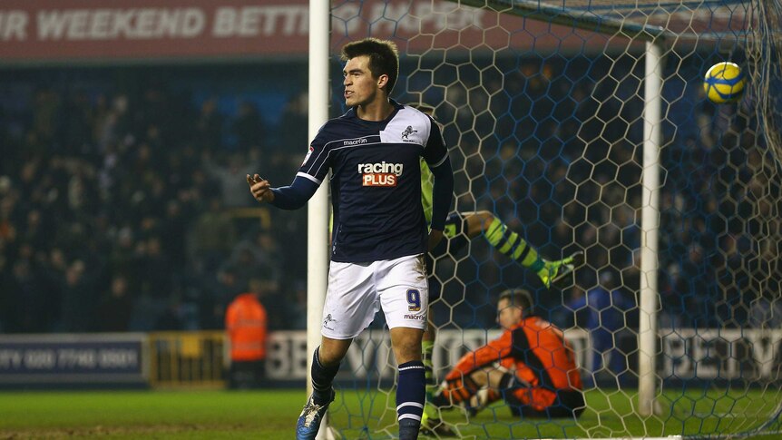 John Marquis celebrates his winner for Millwall over Aston Villa in the FA Cup fourth round.
