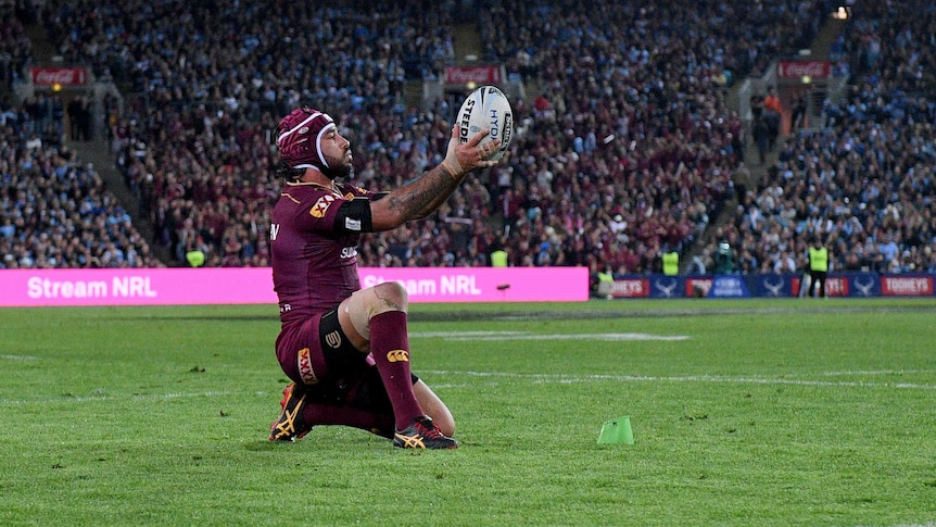 The Maroons' Johnathan Thurston lines up the winning conversion for Queensland against NSW in State of Origin Game II