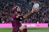 The Maroons' Johnathan Thurston lines up the winning conversion for Queensland against NSW in State of Origin Game II